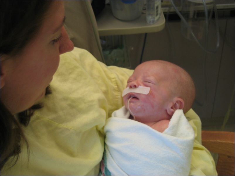 Meghan holding Sebastian